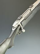 Weatherby Mark V .300 bolt-action rifle with composite stock, chequered semi-pistol grip, scope