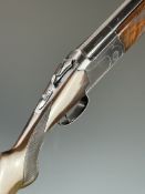 Lanber 12 bore over and under ejector shotgun with border engraved locks, underside, top plate and