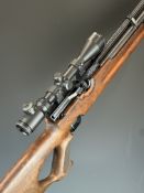 Weihrauch HW100 .22 PCP air rifle with two 15 shot magazines, shaped and textured grip, adjustable