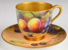 Royal Worcester painted fruit cabinet cup and saucer with decoration of apples, peaches, grapes