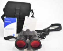 A pair of Zeiss Victory RF 10x56 range finder binoculars, in carry bag with lens caps.