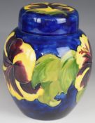 Moorcroft covered ginger jar decorated in the yellow Hibiscus pattern, with Queen Mary paper label