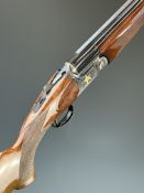 Sabatti Jaguar 12 bore over and under ejector shotgun with engraved scenes of gold birds to the