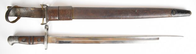 American WW1 Remington bayonet dated 1917 with wooden grips, 43cm fullered blade, scabbard and frog.