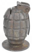 Inert British WW1 Mills bomb No.36 grenade stamped 'JMD & SL 1917' and mounted as a paperweight.