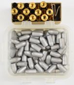 Eighty five .300 Sherwood lead rifle bullet heads and 21 unprimed brass cases.