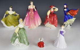 Seven Royal Doulton figurines including Elizabeth and May, tallest 25cm