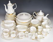 Royal Albert dinner and tea ware in the Val D'or pattern, approximately 77 pieces.