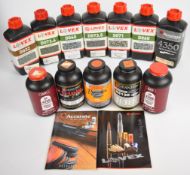 Twelve bottles of shotgun or rifle cartridge re-loading powder including Lovex/ Accurate D032, D060,