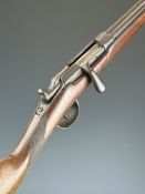 Gras pattern 12 bore bolt-action shotgun with chequered grip and 31 inch barrel choked cylinder,