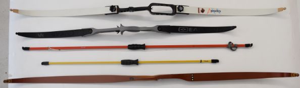 Five archery bows including Petron, Aplollo Black Sheep, Easton and a laminated wooden example.