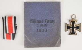 WW2 Nazi German Iron Cross 2nd class, in original blue paper envelope, with further information
