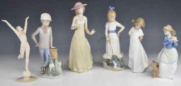 Five Nao figurines and a Hutschenreuther Art Deco style figurine of a nude dancer, tallest 20cm