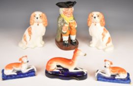 Pair of Miranda C Smith Staffordshire style spaniels, pair of recumbent greyhounds, figural pen