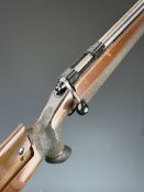 Tikka M55 6.5x47 bolt-action target rifle with textured semi-pistol grip and forend, adjustable comb