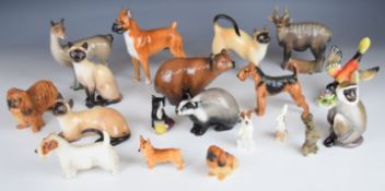 Eighteen Royal Doulton dog, cat and wild animal figures including several 'K' series dogs, tallest