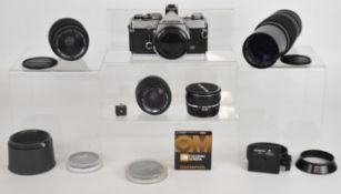 Olympus OM-1N 35mm SLR camera, with Olympus Zuiko MC auto-2 1:2 f=28mm, auto-zoom 1:3.6 f=35-70mm