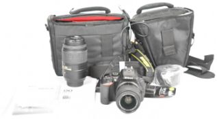 Nikon D5500 digital SLR camera with DX VR 18-55mm 1:3.5-5.6G and DX 55-300mm 1 :4.5-5.6G ED lenses