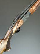 ATA SP 12 bore over and under ejector shotgun with chequered semi-pistol grip and forend, single