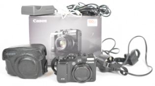 Canon Powershot G10 14.7MP digital camera, in original box with charger etc