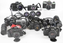 35mm SLR cameras, lenses and accessories to include Nikon F-601 with AF Nikkor 1:1.8 50mm, Sigma 1: