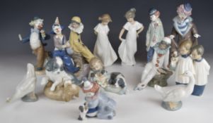 Fourteen Lladro / Nao figures including seven clown examples, tallest 25cm