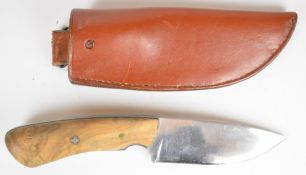 Q hunting or similar knife with inlaid wood grips and blade marked Q, overall length 20.5cm, in