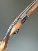 Miroku 12 bore over and under ejector shotgun with engraved lock, underside, trigger guard and thumb