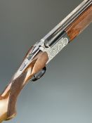 Fabarm 12 bore over and under ejector shotgun with engraved locks, underside, top plate and thumb