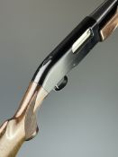 Beretta RS 200 12 bore 3-shot pump-action shotgun with named action, chequered semi-pistol grip