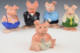 Set of five Wade Natwest pig family money boxes, tallest 16cm