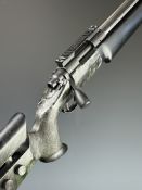 Remington Model 700 6mm BRX bolt-action rifle with custom composite stock, textured semi-pistol