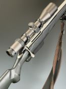 Tikka T3 6.5x55 bolt-action rifle with composite stock, textured semi-pistol grip and forend,