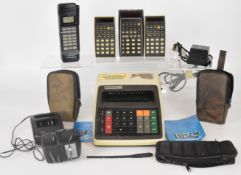 Vintage calculators and similar electronics comprising two HP-25 and one HP 45 Hewlett Packard