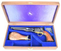 Colt .44 six-shot single-action percussion revolver with brass trigger guard, wooden grips and named