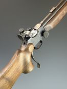 BSA Martini-International Mk II .22 underlever-action target rifle with raised cheek piece, scope