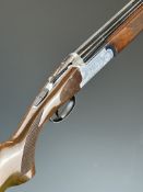 Lincoln Premier No.2 20 bore over and under ejector shotgun with engraved scenes of rabbits and