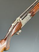 Nikko Model 712 12 bore over and under ejector shotgun with engraved locks, trigger guard, underside