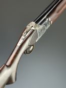 Winchester 6500 Trap 12 bore over and under ejector shotgun with line engraved lock and underside,