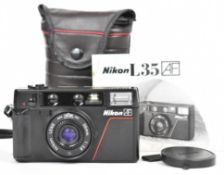 Nikon L35 AF 35mm compact camera with front cap, soft case and instructions