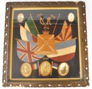 WW1 Wiltshire Regiment interest framed embroidery with photographs set around the embroidered flags,