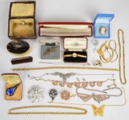 A collection of jewellery including 9ct gold cross (0.9g), Sarah Coventry brooch, cameo brooch,