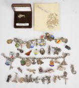 Two silver charm bracelets and a collection of silver/ 800 charms including 'Hapi' Egyptian god, '