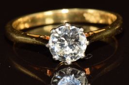 An 18ct gold ring set with a round brilliant cut diamond of approximately 0.7ct, 3g, size M