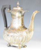 Late Victorian or early 20th century hallmarked silver coffee pot with embossed and engraved
