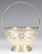 Elizabeth II hallmarked silver condiment or preserve basket, with pierced and embossed foliate