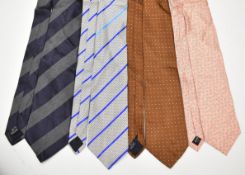 Four silk ties including Dunhill floral pink, Burberry grey and navy, Burberry brown spotted and