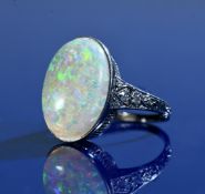 Art Deco platinum ring set with an opal cabochon of approximately 5.6ct and diamonds to the