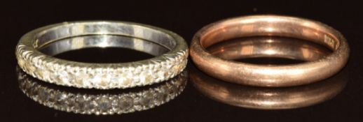 A 9ct white gold half eternity ring and a 9ct gold wedding band, 5.2g, size N & Q