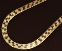 A 14k gold ribbon necklace, 23.3g, 40cm